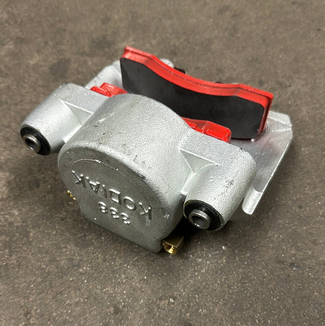 DBC-338-D-L Genuine Kodiak Brake Caliper, 9K - 10K Axles, Pads Included, Left Side - Brakes 4 Trailers